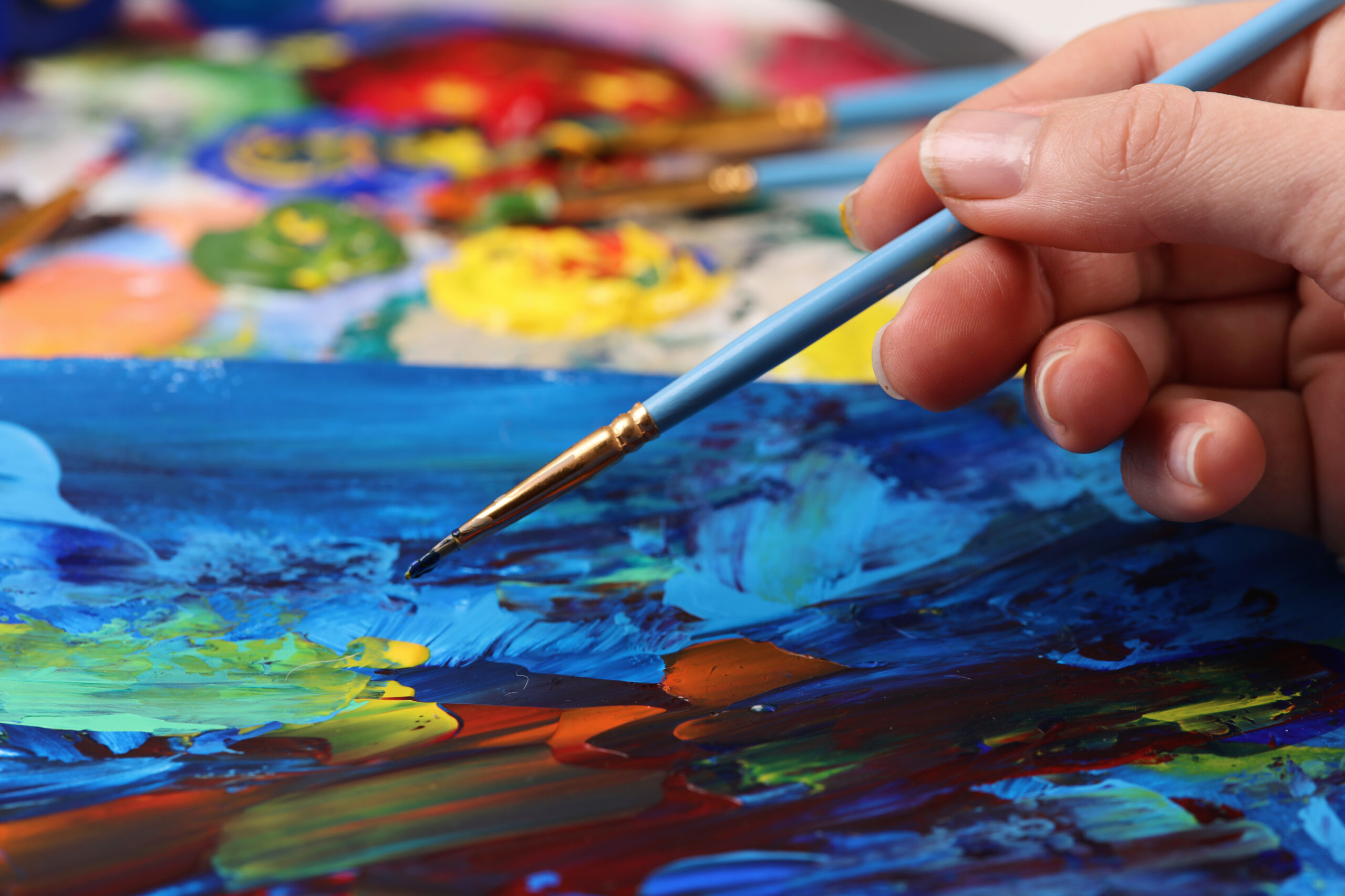 Artist,Hand,With,Brush,Painting,Picture,Close,Up.,Art,,Creativity,
